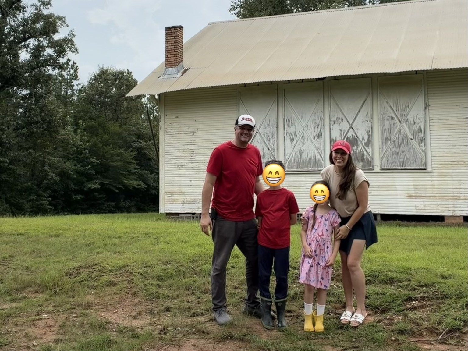 Family photo outside with smiley faces over the kids